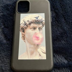iPhone 11 statue blowing bubblegum case.